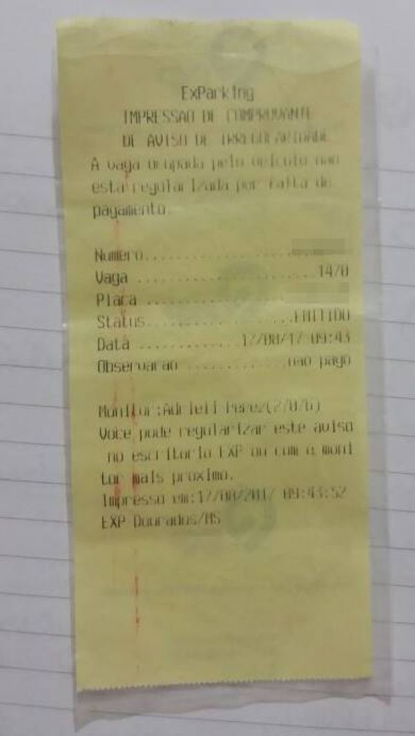 Bilhete informando a multa de R$ 10