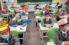 Chapéu curioso cria diâmetro de segurança em escola chinesa - Foto: Reprodução