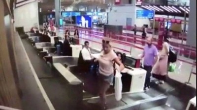 Passageira tenta embarcar junto com malas em Istambul (Foto: Reprodução/YouTube)