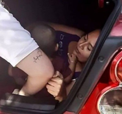 Mulher e filho de motorista de aplicativo escondidos na mala de carro - Foto: Reprodução/Facebook