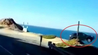 SUV 'decola' na direção do Oceano Pacífico (Foto: Reprodução/YouTube)
