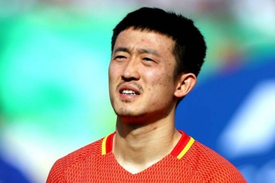 Jiang Zhipeng, jogador da seleção chinesa - Amin M. Jamali/Getty Images   Leia mais em: https://placar.abril.com.br/placar/china-proibe-jogadores-da-selecao-de-fazerem-tatuagens/