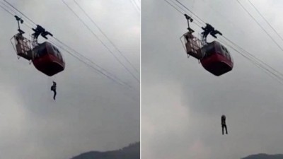 Turista desce por corda de bondinho quebrado na Índia (Foto: Reprodução)