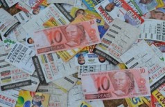 Santinho em forma de dinheiro imita nota de R$ 10 em Rondônia