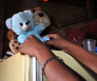 Mãe não quis mostrar o rosto, só brinquedos do filho (Bruno Henrique)