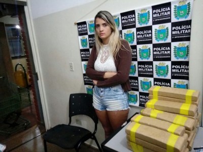 Em Dourados, jovem de 20 anos é presa pela PM com seis malas cheias de maconha (Foto: Divulgação/Polícia Militar) ()
